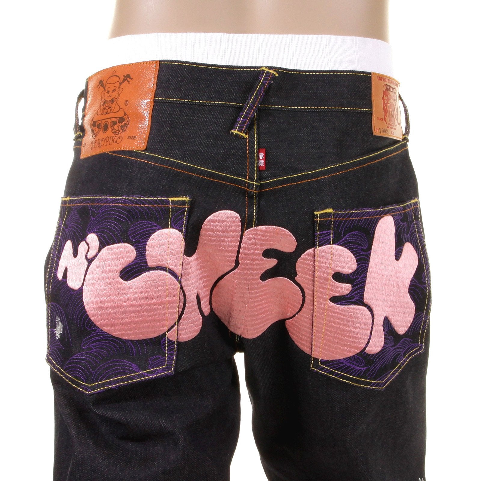 RMC JEANS DARK INDIGO VINTAGE CUT RAW DENIM JEANS WITH DIZZEE RASCAL TONGUE N CHEEK PURPLE EMBROIDERY REDM5658