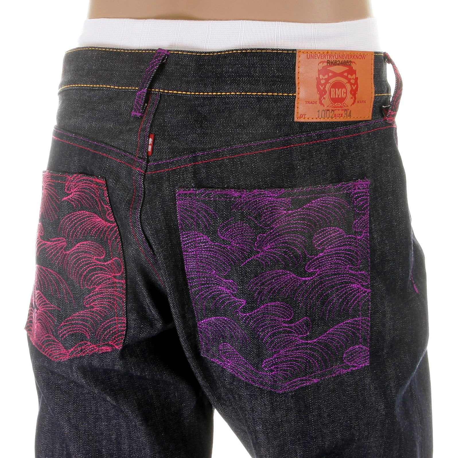 RMC MARTIN KSOHOH MAD PATCH FUSCIA AND VIOLET EMBROIDERED DARK INDIGO RAW DENIM JEANS WITH VINTAGE CUT REDM3142