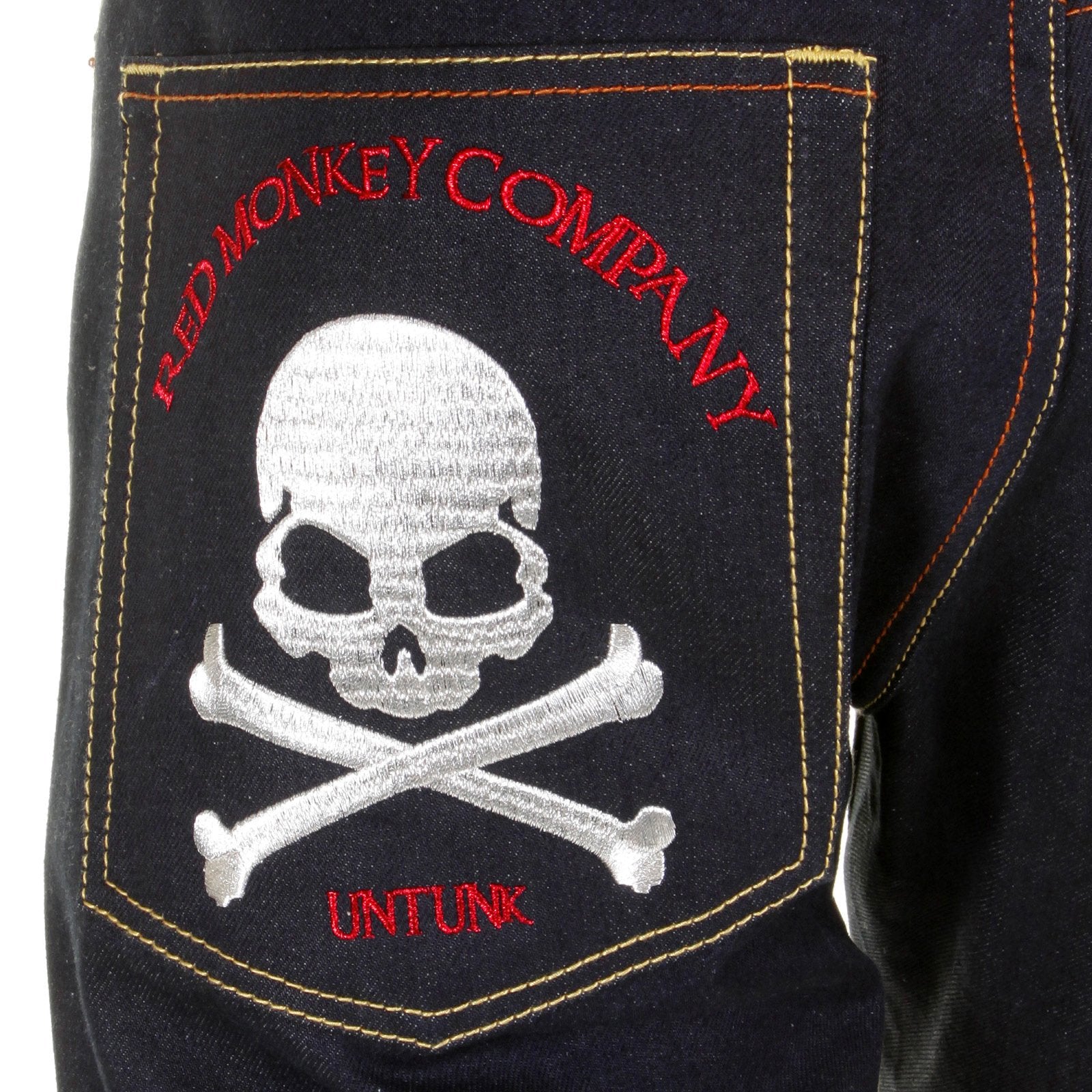 RMC JEANS MODEL 1001 SILVER SKULL AND CROSSBONES RAW DENIM SLIM FIT JEANS IN DARK INDIGO REDM1157