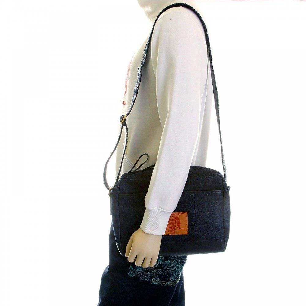 RMC JEANS UNISEX FULLY LINED DENIM DESPATCH BAG WITH LEATHER BASE REDM5527